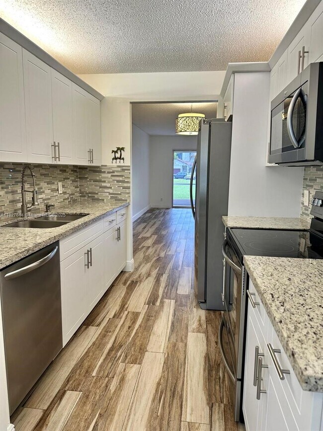 Building Photo - 1300 SW 130th Ave
