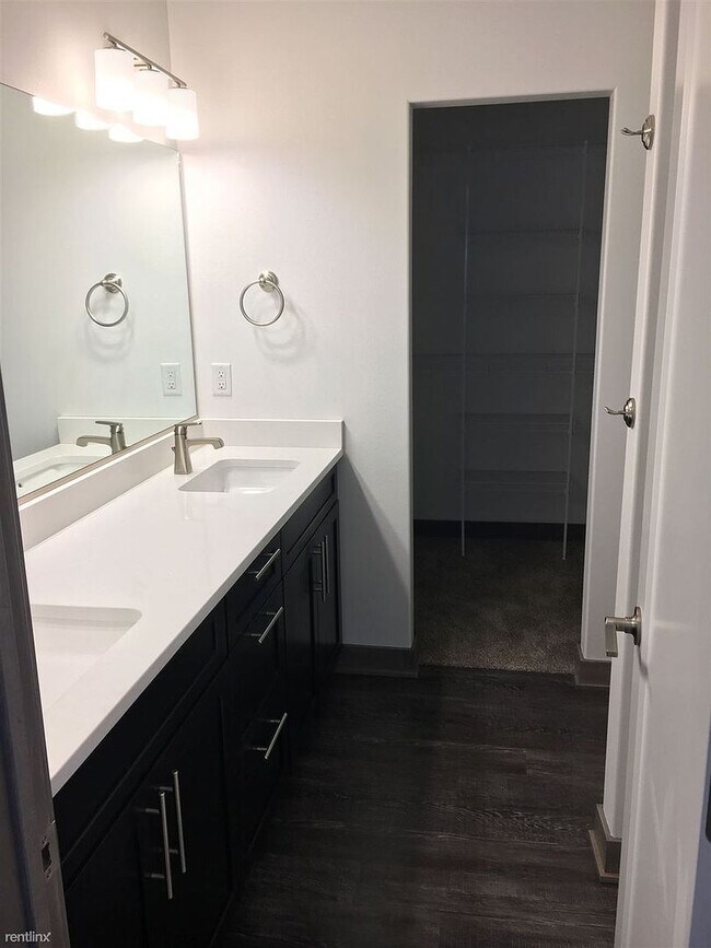 Building Photo - Spacious 4 bedroom/3 bath home with finished lower level and attached 2 car garage