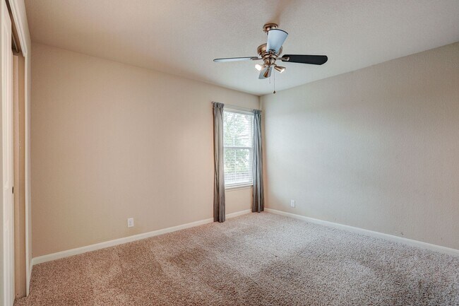 Building Photo - Bright & Roomy 4BR • 2.5BA • Two-Level Living