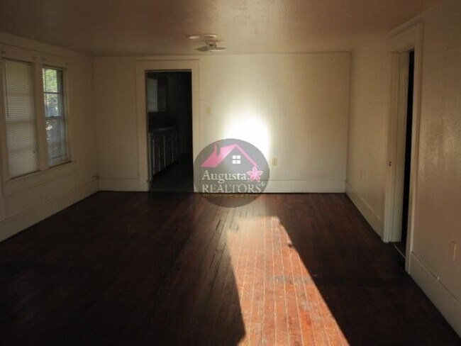 Building Photo - Three