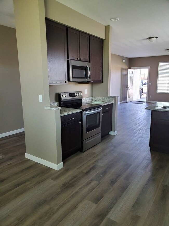 Building Photo - Newer Home with Garage & Fenced Yard