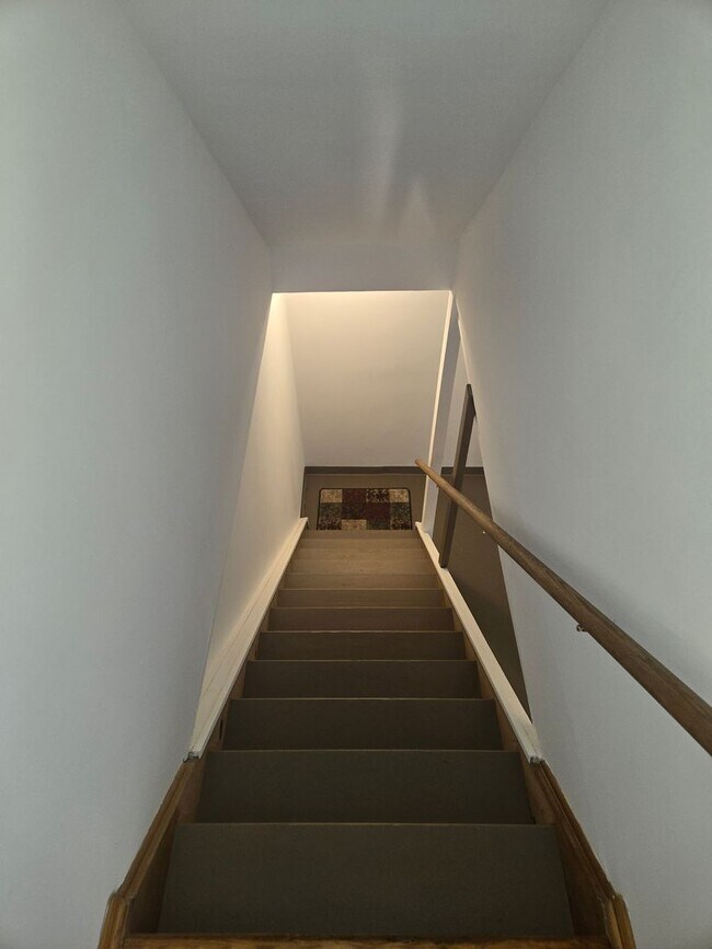Building Photo - Updates abound at this SPACIOUS, half duplex with 3+ off-street parking spots, 3-bedrooms and 2 f...