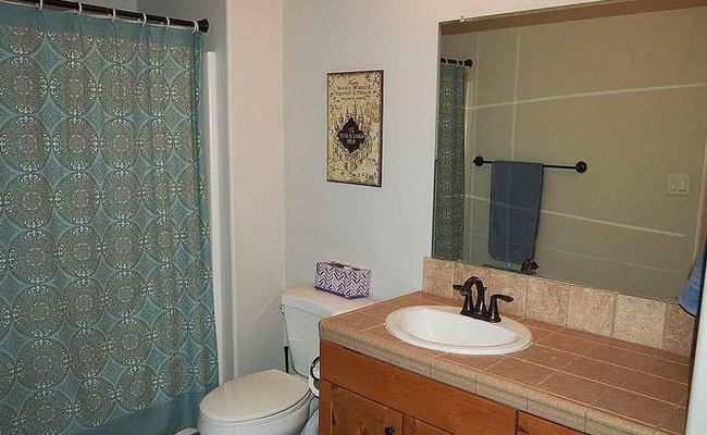 Upstairs guest bath - 10380 W Breckfield St