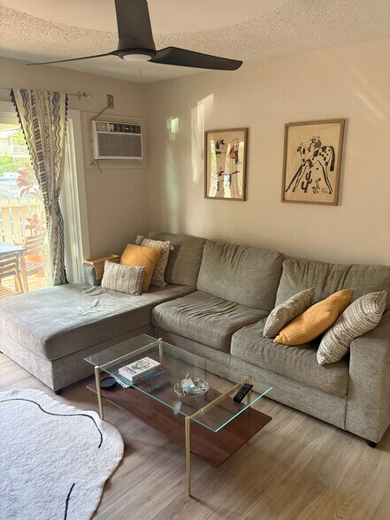 Comfortable sectional couch and A/C unit - 140 Uwapo Rd