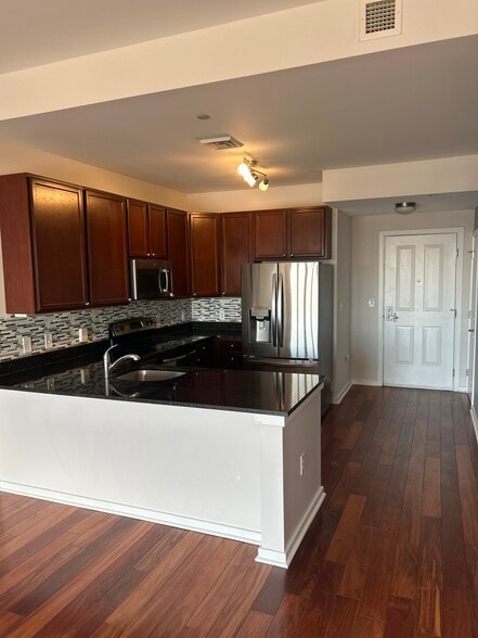 Kitchen and entry door - 530 Harlan Blvd