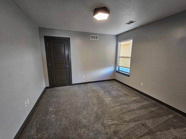 Building Photo - 7620 N Mercier Ct
