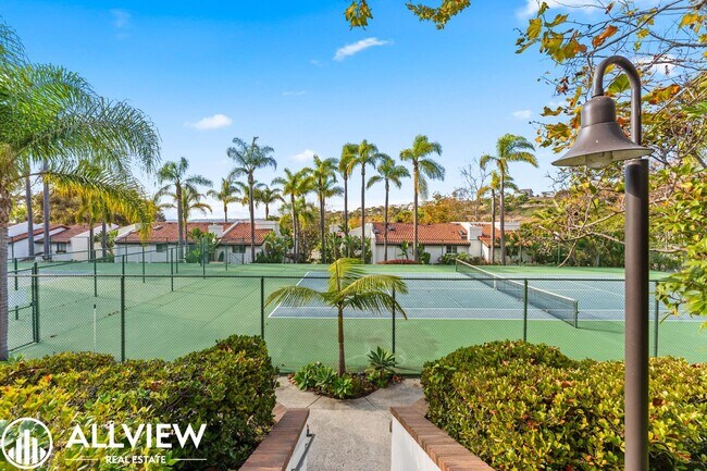 Building Photo - Upgraded 2-Bedroom Townhome in the Gated C...