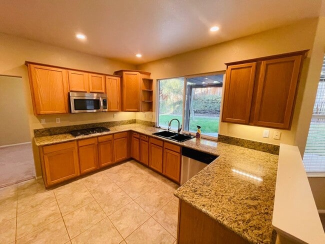 Building Photo - 42020 Dahlia Way