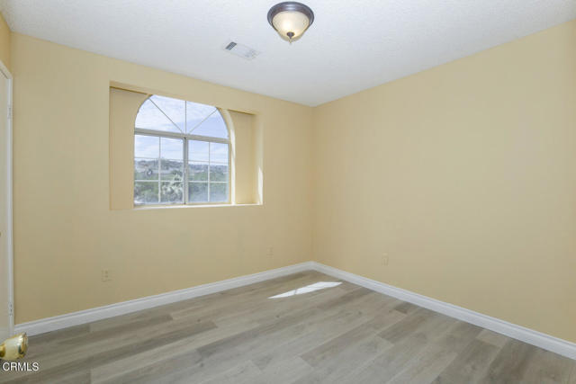 Building Photo - 3831 E Ave T 8