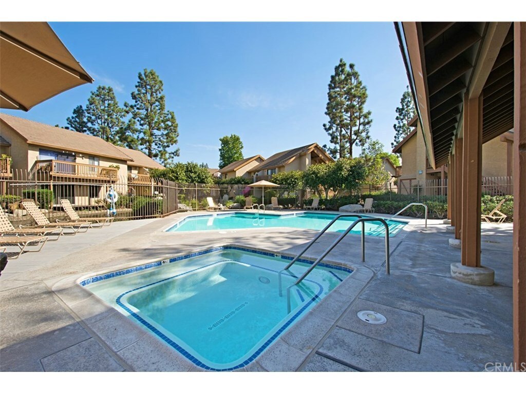 Community swimming pool and spa. - 426 Orange Blossom