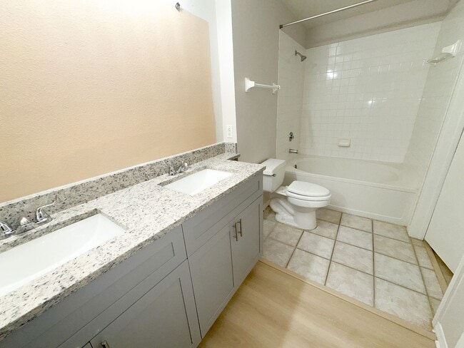 Building Photo - MOVE NOW-Remodeled bathroom & kitchen! NEW VINYL PLANK flooring & fresh paint! 2 bedroom 1 bath c...