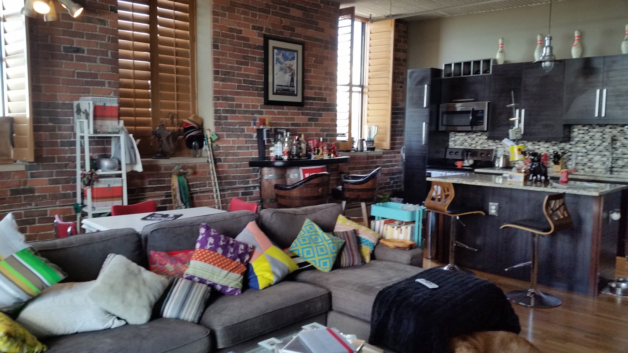 Exposed brick and large double hung windows - 2261 Blake Street