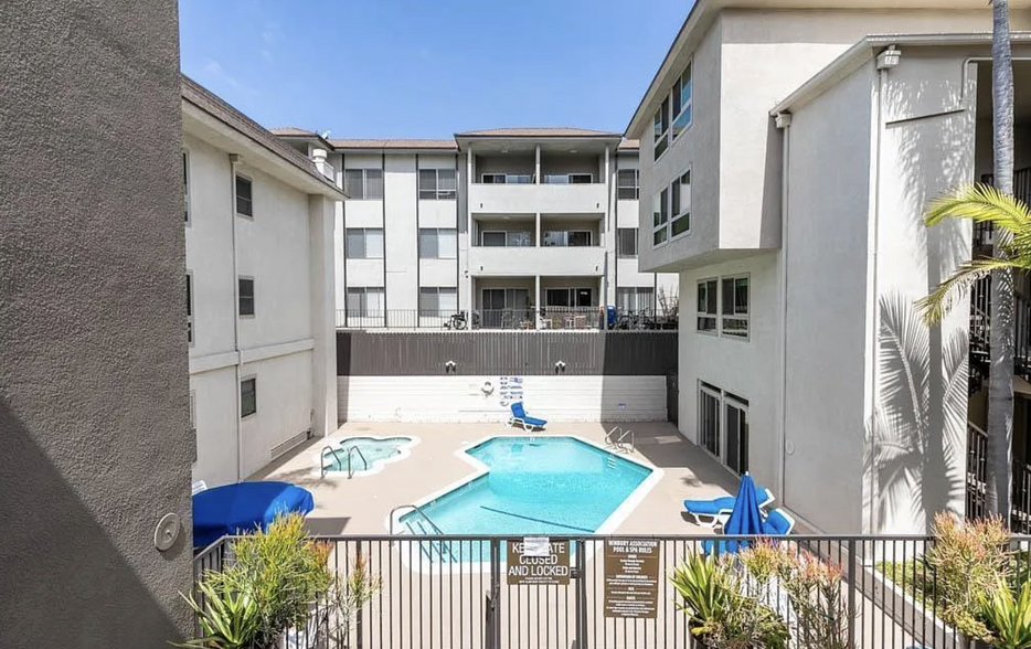 Pool view from outside the unit. - 6001 Canterbury Dr