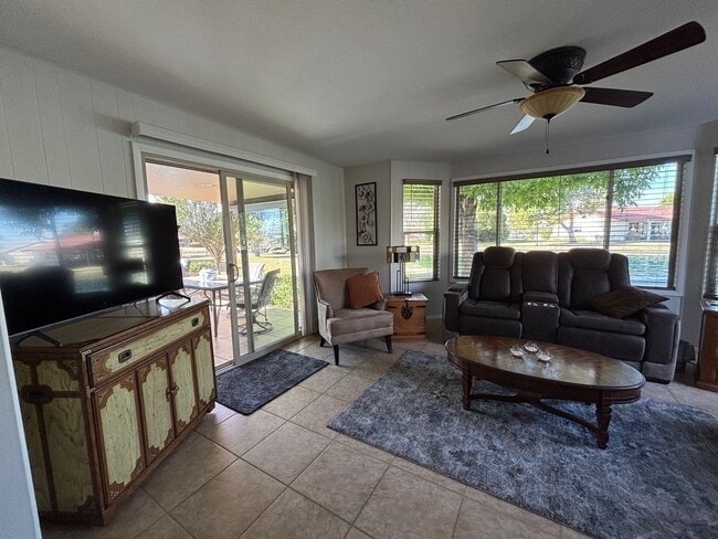 Building Photo - Welcome to this stunning updated 2-bedroom, 2-bathroom home on a lake located in the vibrant comm...