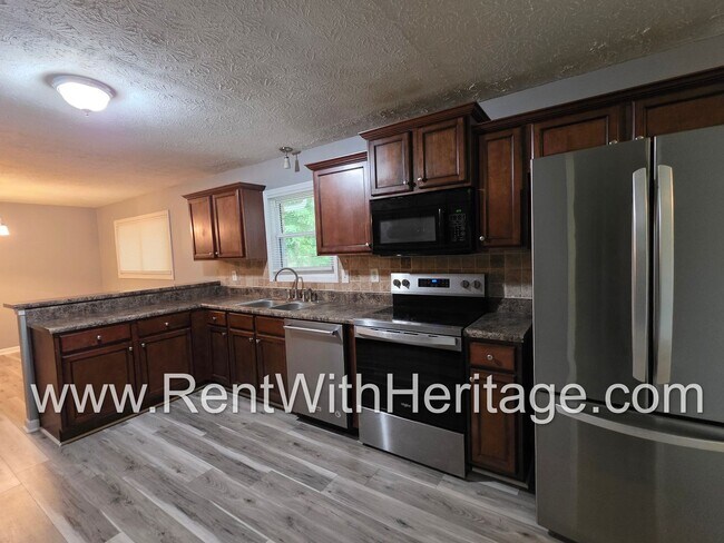 Building Photo - Gorgeous 4 Sided Brick Home/ Upgrades Galore/ Full Unfinished Basement