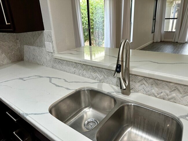 Building Photo - Gorgeous remodel update! No neighbors behind hillside lot