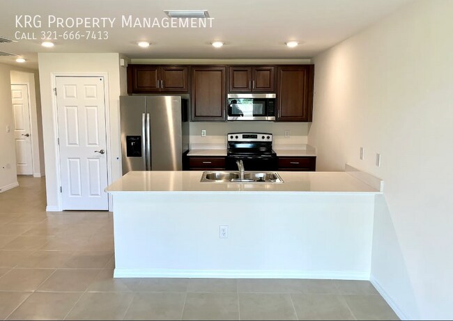 Building Photo - 7009 Blue Cypress Way