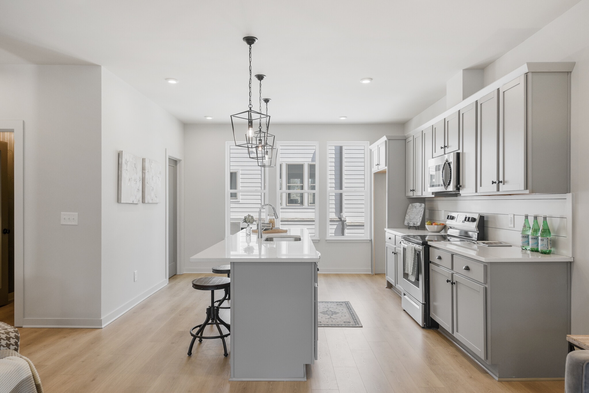 Entertain with ease from this oversized island. - 358 E Village Ln