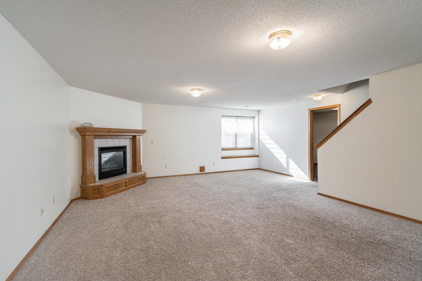 Family Room with Gas Fireplace - 6317 Quail Ridge St
