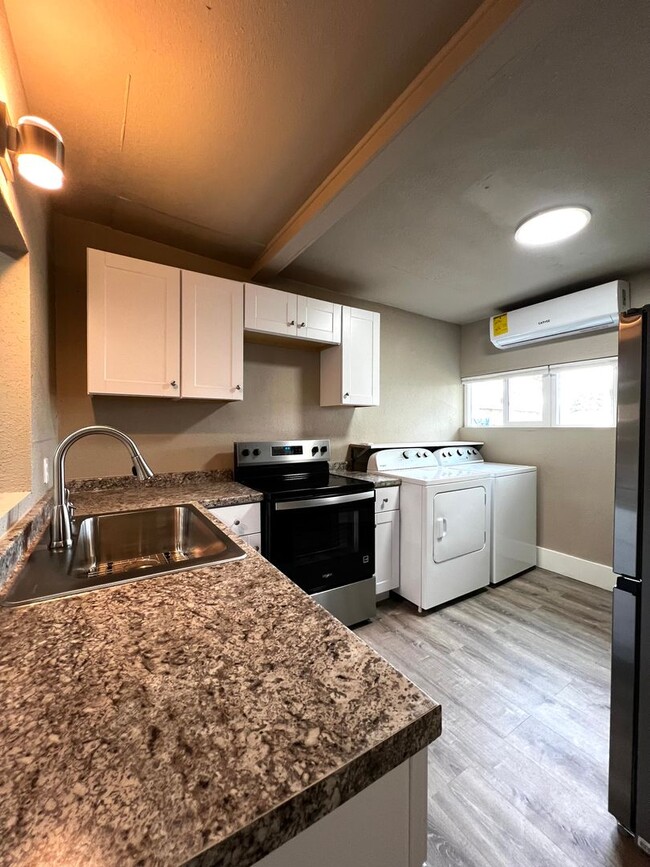 Building Photo - Non-Refundable & Security Deposit Total: $1200.00