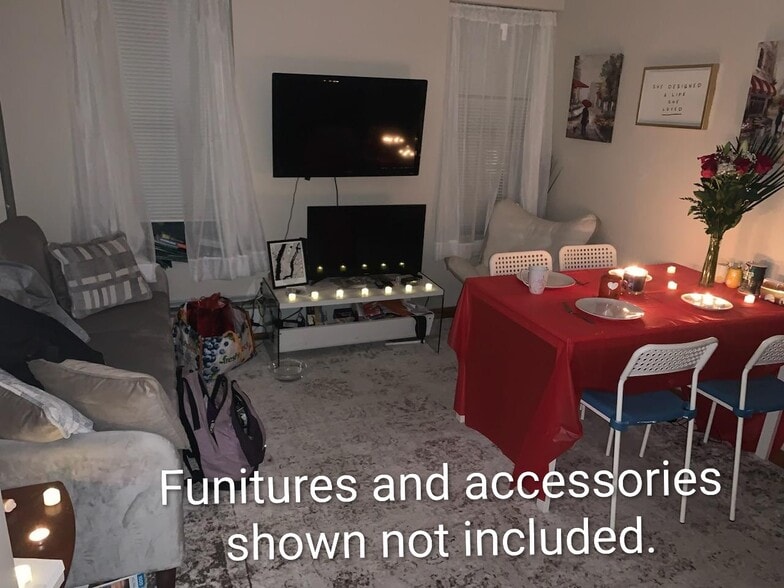 Living room furnished view. - 240 E 23rd St