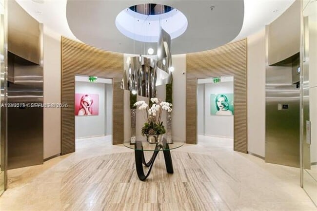 Building Photo - 10275 Collins Ave