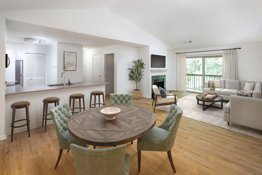 Renovated Package III dining and living room with hard surface flooring - eaves West Windsor