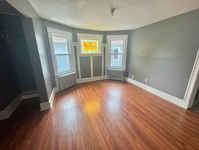 Building Photo - Stunning Renovated 4-Bedroom Home Near Dow...