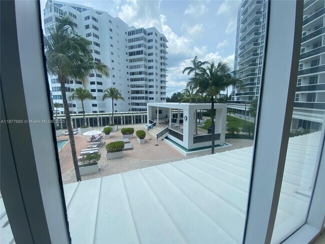 Building Photo - 10275 Collins Ave