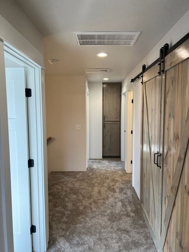 Building Photo - ALMOST NEW CONSTRUCTION/ 4 BEDROOM IN NEWER UPCOMING NEIGHBORHOOD