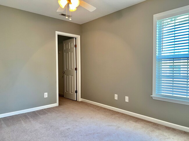 Building Photo - Spacious 3 BR House w/ Fenced Backyard and...