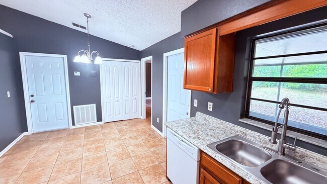 Building Photo - $500 OFF A MONTHS OF RENT IF YOU APPLY BEFORE MAY 12TH. Pet-Friendly 3BR Home with Spacious Yard ...
