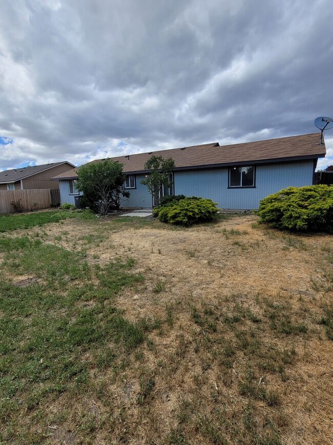 Building Photo - House with Garage & Fenced Yard