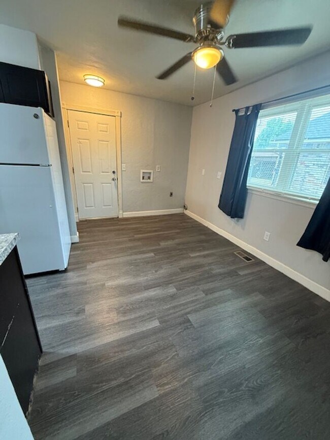 Building Photo - 3 bedrooms - 1.5 baths - Wood-look Floors ...
