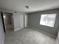 Building Photo - Cozy 2 bd, 1.5 bath condo with open floor plan.
