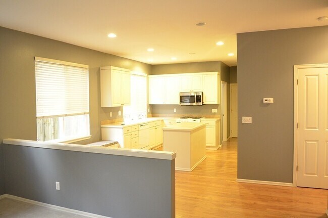 Building Photo - Beautifully Designed Home with Open Layout and Island Kitchen