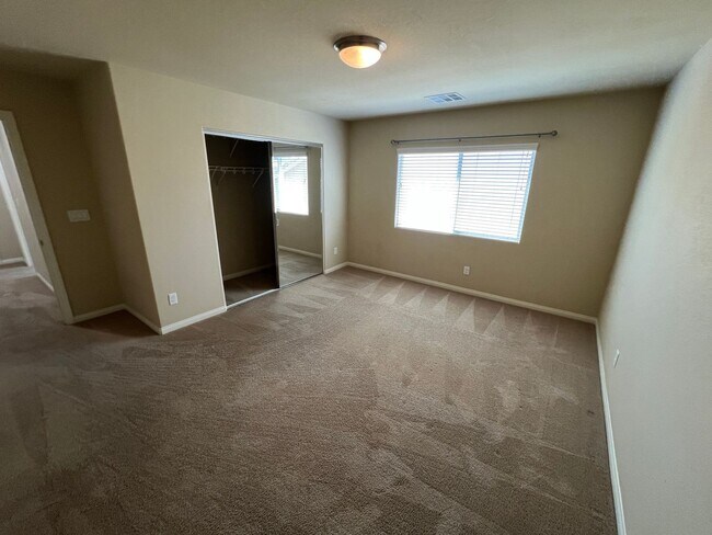 Building Photo - A Fantastic 4 Bedroom Home with the primary Downstairs, in Silverado Ranch