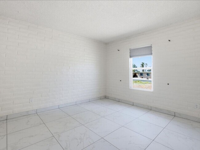 Building Photo - Concept Living with Large Enclosed Backyard & Modern Upgrades!
