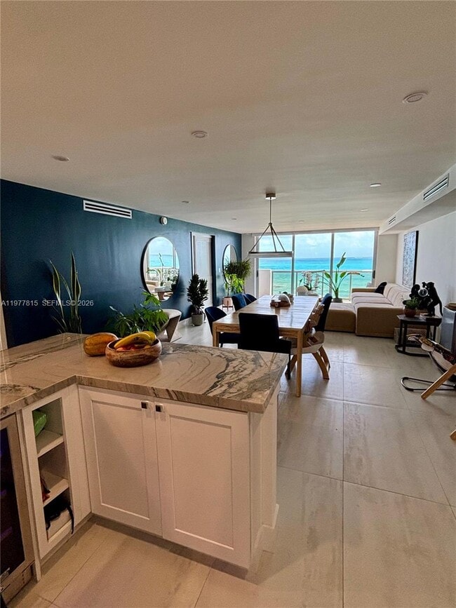 Building Photo - 6039 Collins Ave