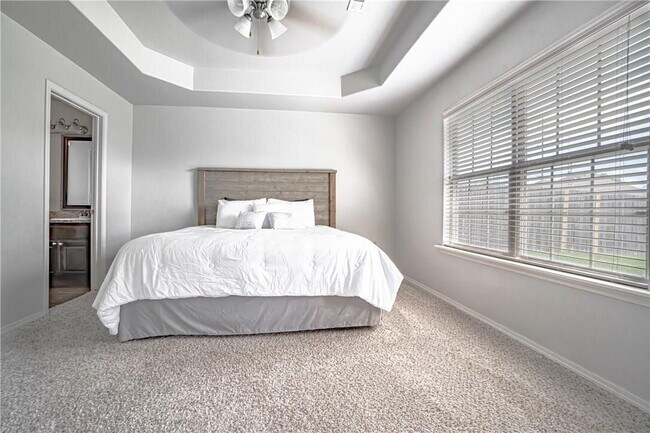 Building Photo - Spacious 4BR home in Bentonville with solar panels & Tesla EV charger!   Schedule a showing: 479-...