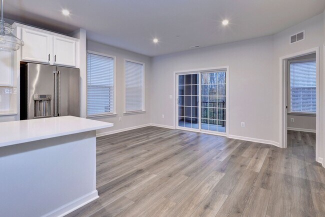 Building Photo - Three Story Brick End Unit with Rooftop Terrace