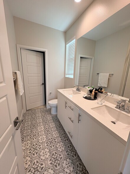 Primary bath with upgraded flooring/double vanity - 2241 Horseback Rd