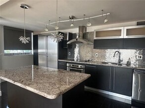 Building Photo - 9273 Collins Ave