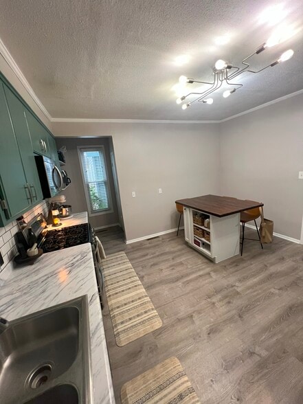 Updated kitchen floor - 413 19th Ave NE