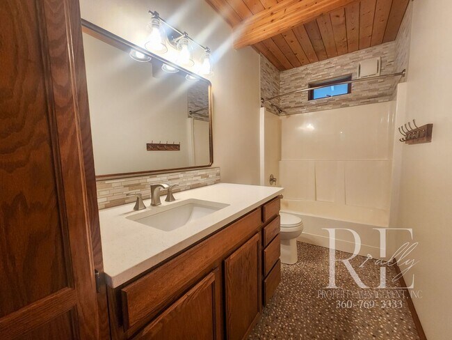 Building Photo - Waterfront Living in Indianola – Dock, Bea...