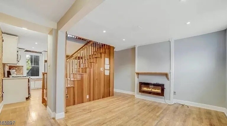 1st FL: Living Rm with fireplace - 223 Jackson St