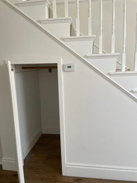 Storage nook under stairs - 2220 Curtis Ave