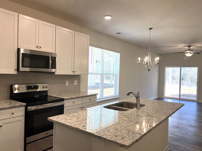 Building Photo - $1,000 Off First Full Month Rent