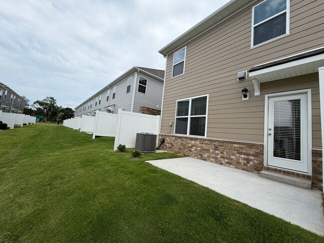 Building Photo - Available in River Landing