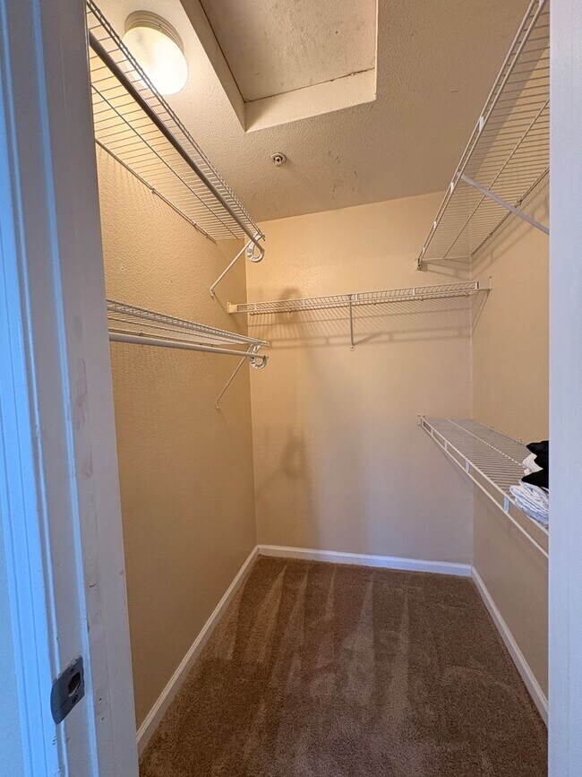 Building Photo - 1BR Condo with Private Balcony, Central A/C & Community Amenities in Corona